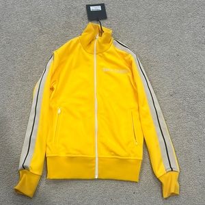 Palm angles yellow track jacket.